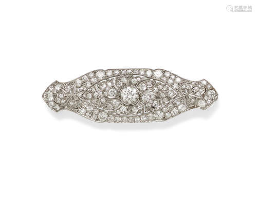 A diamond and platinum brooch