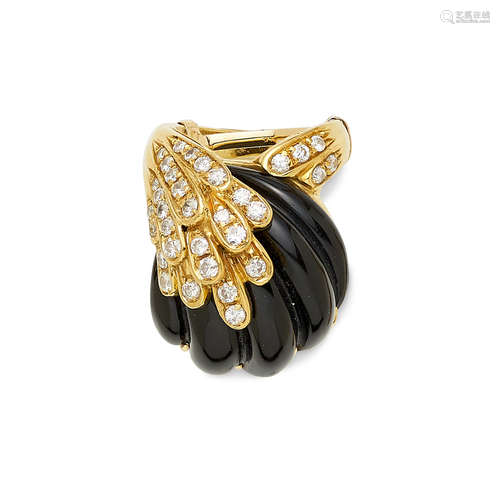 A black onyx, diamond and 18k gold ring