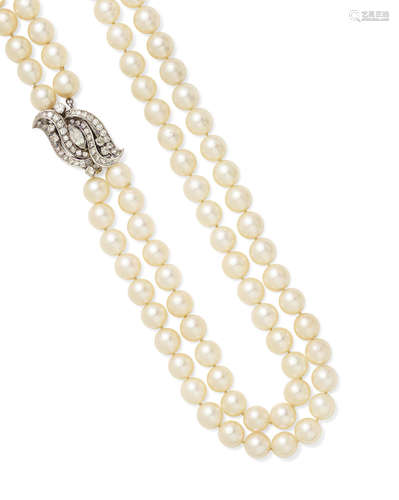 A cultured pearl necklace with diamond and white gold clasp