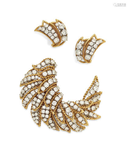 A diamond and 18k bi-color gold brooch and ear clip set