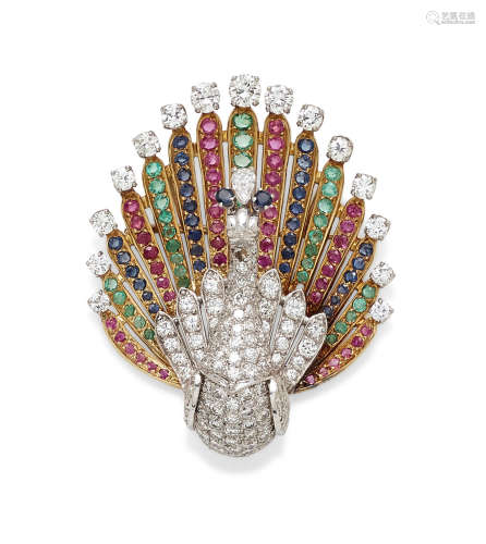 A diamond and gem-set bi-color gold peacock pendant/brooch