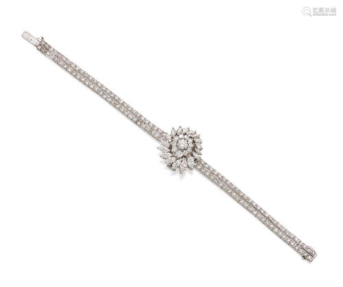 A lady's diamond and 14k white gold concealed dial bracelet wristwatch