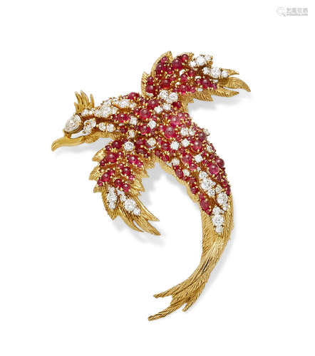 A ruby, diamond and 18k gold bird brooch