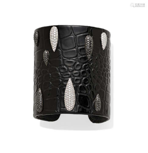 A colored diamond, Diamond, gold and Leather Cuff