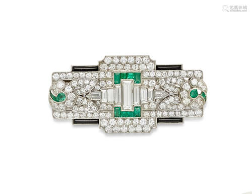 An Art Deco Emerald, black Onyx, Diamond and Platinum Brooch, circa 1930