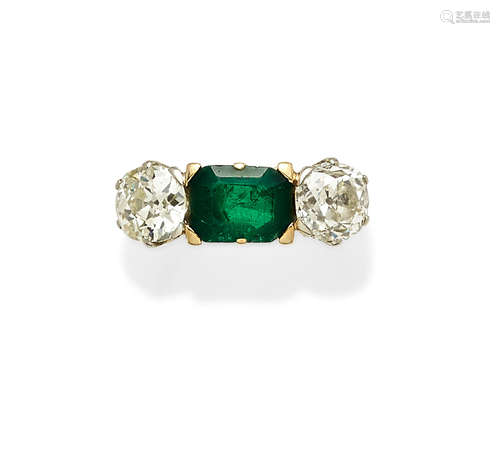 An emerald, diamond, platinum and 18k gold ring