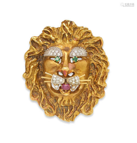 A diamond, ruby, emerald and 18k gold lion head brooch