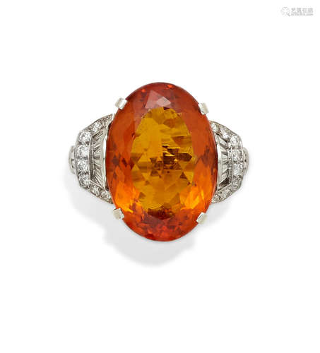 A citrine, diamond and platinum ring