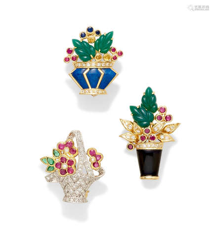 A set of three diamond and gem-set gold flower brooches