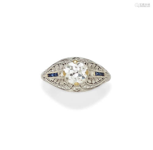 A diamond, sapphire and platinum ring