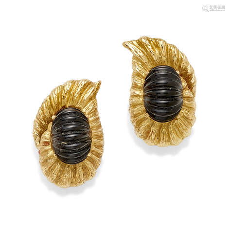 A pair of black onyx and 18k gold ear clips