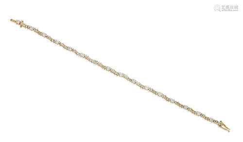 A diamond and gold bracelet