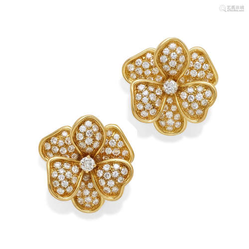 A pair of diamond and 18k gold flower earrings