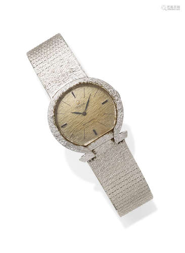 An 18K white gold integral bracelet wristwatch