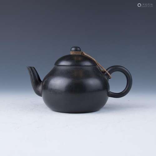 A Globular-Form Black Teapot