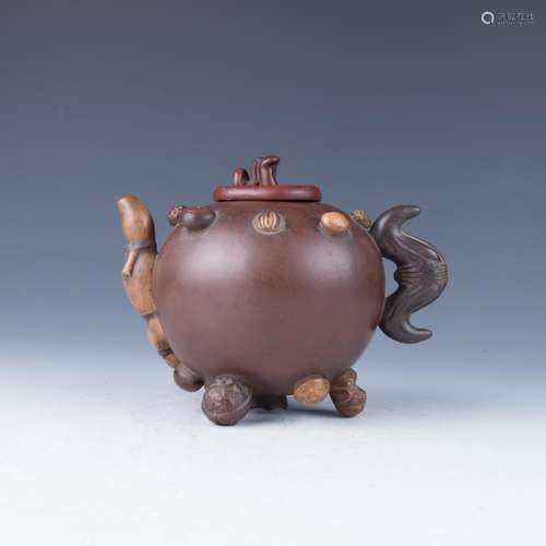 An Yixing Hundred-Fruit Covered Teapot, 19th/20th