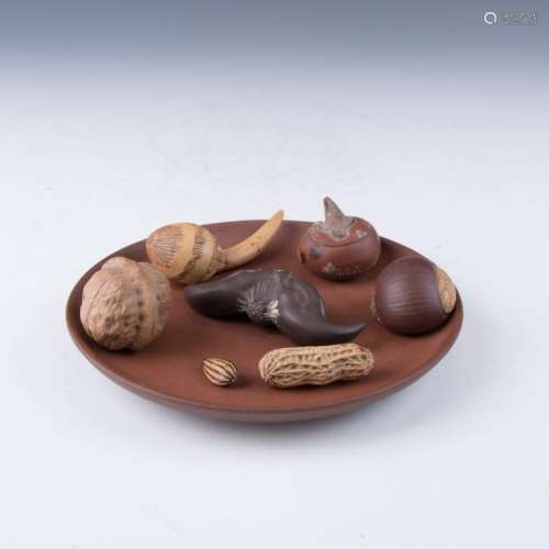 A Group of Eight Yixing Nuts, Fruit and Seeds