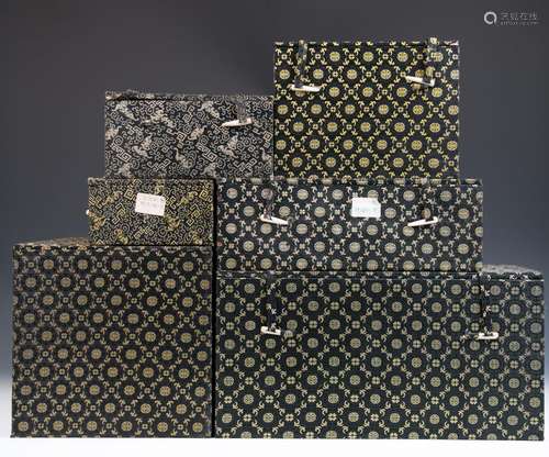 Six Black and Yellow Ground Storage Boxes