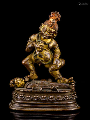 A FINE AND RARE BRONZE FIGURE OF JAMBHALA