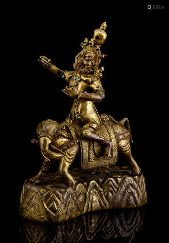 A RARE GILT-BRONZE FIGURE OF A FEMALE DEITY