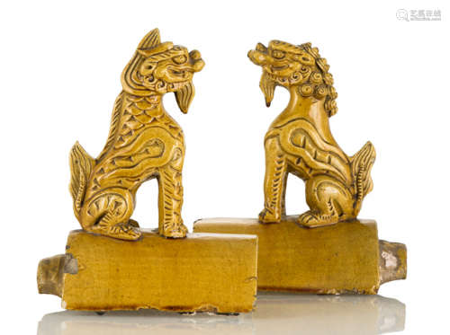 A PAIR OF YELLOW-GLAZED ROOF TILES WITH MYTHICAL BEASTS