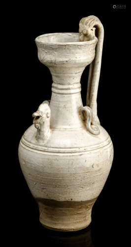 A CREAM GLAZED CIZHOU EWER WITH A CHICKEN HEAD SPOUT