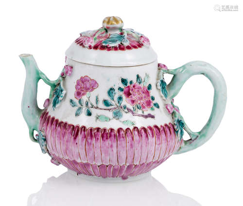 A POLYCHROME PAINTED PORCELAIN TEAPOT AND COVER