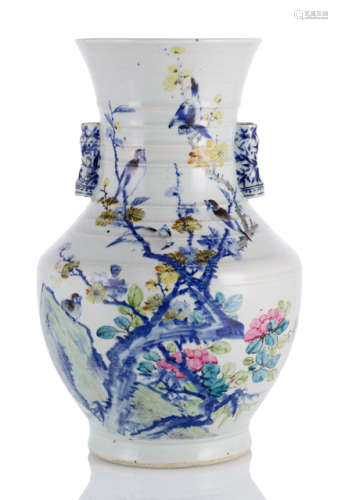 A LARGE HU-SHAPED HANDLED PORCELAIN VASE WITH BIRD AND BLOSSOM DECOR