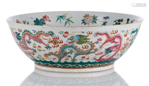 A POLYCHROME DECORATED DRAGON BOWL WITH FLOWER SPRAYS