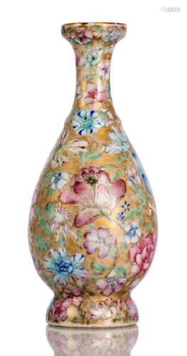 A SMALL BOTTLE VASE WITH MILLE-FLEUR DECOR ON GOLDEN GROUND