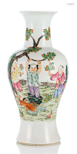 A BALUSTER-SHAPED PORCELAIN VASE WITH A DECOR OF BOYS AT PLAY