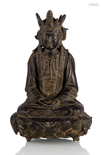 A BRONZE FIGURE OF SEATED GUANYIN