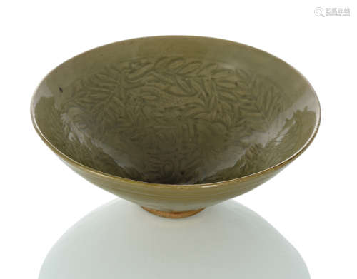 A CONICAL YAOZHOU BOWL WITH INCISED FISH AND WATERPLANT DECOR