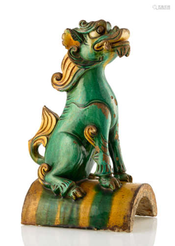A GREEN AND YELLOW-GLAZED ROOFTILE WITH A MYTHICAL BEAST