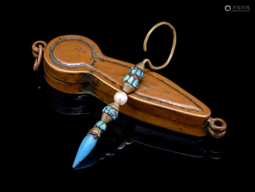 A TURQUOISE AND COPPER OFFICIAL EAR-RING IN FITTING COPPER CASE