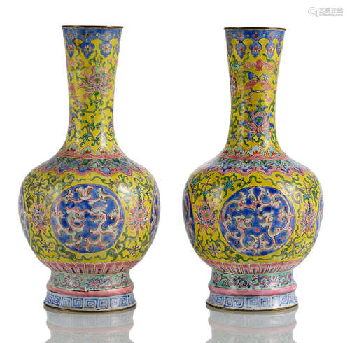 A PAIR OF CANTON ENAMEL VASES WITH FLOWERS AND DRAGON MEDAILLONS