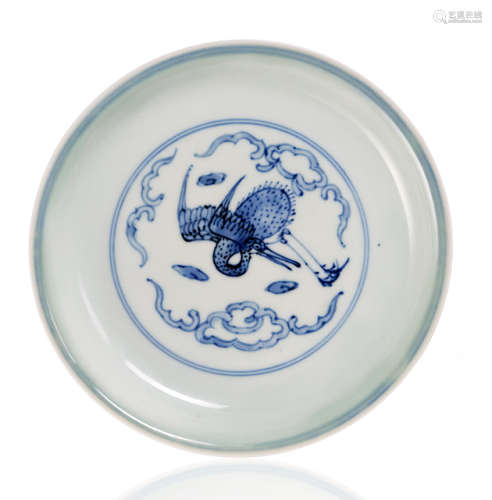 A SMALL DISH WITH A CRANE AMONG CLOUDS IN UNDERGLAZE BLUE