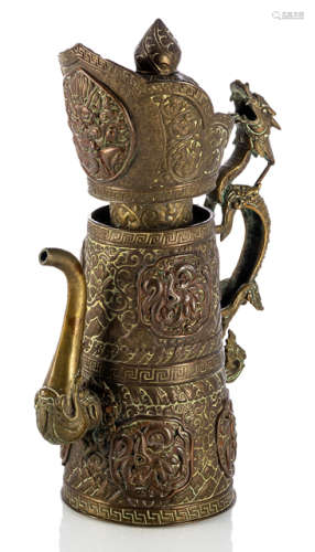 A COPPER AND BRASS REPOUSSÉ EWER AND COVER