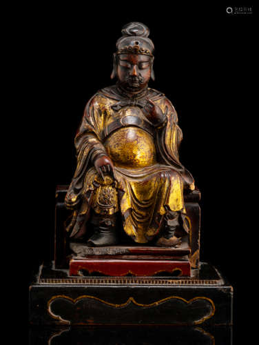 A PARCEL GILT-LACQUER AND POLYCHROME WOOD FIGURE OF PROBABLY GUANDI