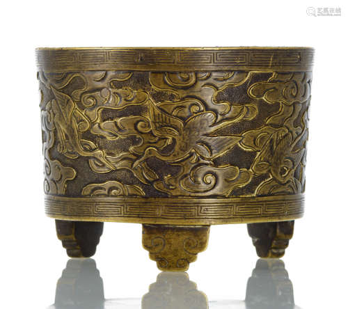 A CYLINDRICAL BRONZE CENSER WITH CRANE DECOR ON THREE RUYI FEET