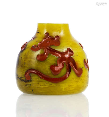 A YELLOW BEIJING GLASS VASE WITH DEEPLY CARVED RED-COLORED CHILONG