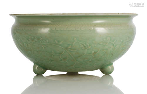 A TRIPOD CELADON CENSER WITH LOTUS DECOR