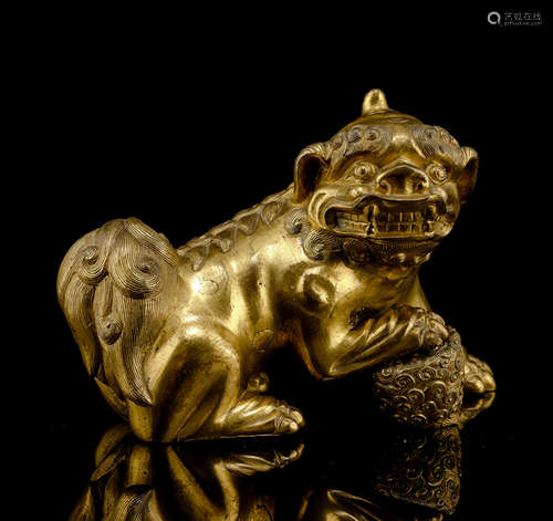 A WELL CAST GILT-BRONZE FABULOUS ANIMAL