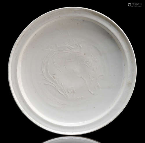 A SMALL DING WARE DISH WITH INCISED DRAGON DECOR