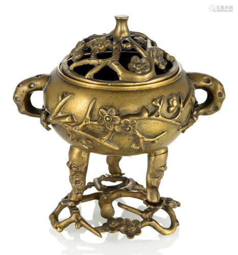 A BRONZE CENSER AND COVER ON ITS STAND