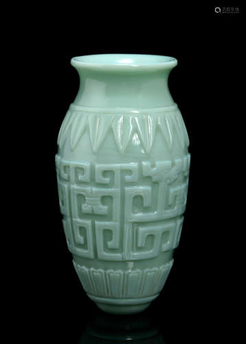 A TURQUOISE BEIJING GLASS VASE WITH ARCHAISTIC RELIEF DECOR