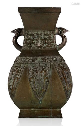 A HU-SHAPED BRONZE VASE IN AN ARCHAIC STYLE