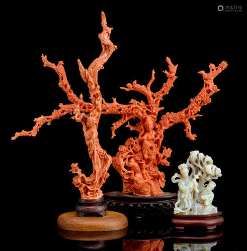 TWO CORAL AND ONE OPAL CARVING ON WOOD STANDS