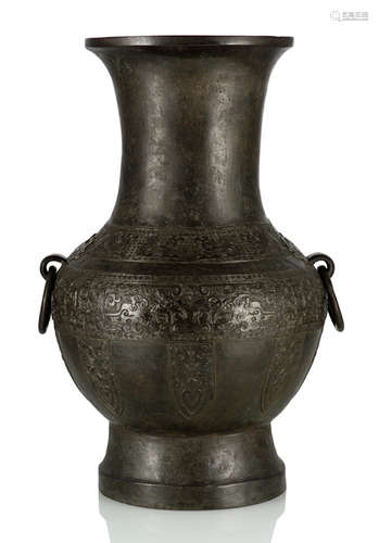 A LARGE BRONZE VASE IN ARCHAIC STYLE