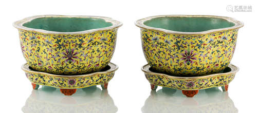 A PAIR OF YELLOW-GROUND LOTOS PORCELAIN JARDINIÉRES WITH STANDS